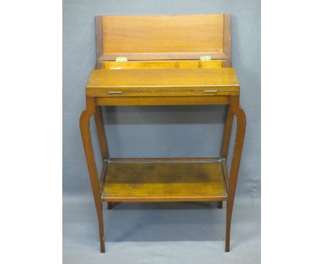 VINTAGE MAHOGANY TWO-TIER SEWING TABLE WITH CONTENTS - twin flap opening top opening to reveal sectional compartments on shap