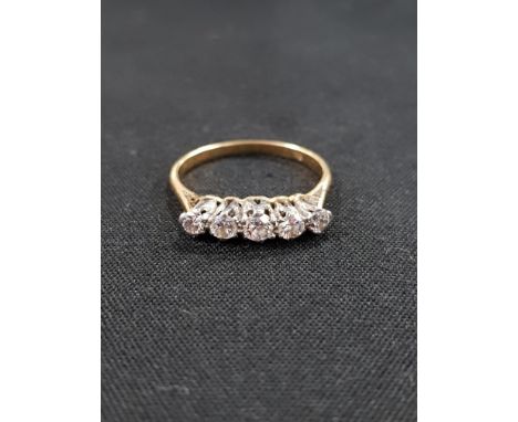 18 CARAT GOLD + 5 STONE DIAMOND RING 