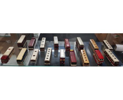 SHELF LOT OF WHITE METAL MODEL BUSES