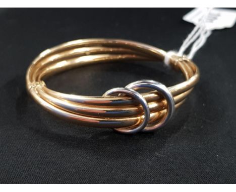 9 CARAT YELLOW &amp; WHITE GOLD BANGLE CIRCA 14.2 GRAMS
