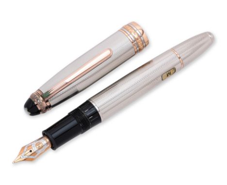 MONTBLANC MEISTERSTUCK 146 75TH ANNIVERSARY FOUNTAIN PEN Engine turned hallmarked sterling silver with gold plated accents, 1