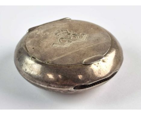 A military silver circular snuff box with hinged cover, Birmingham 1912, with match striker in edge, engraved with 'South Sta