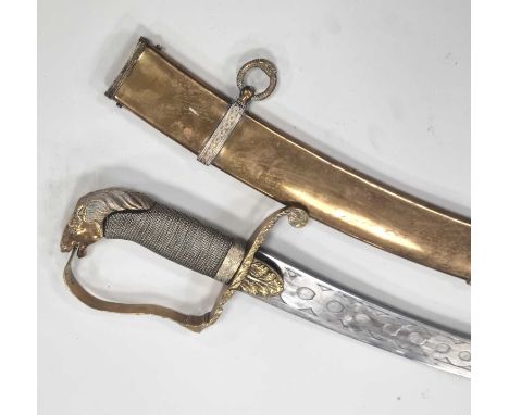 A nice quality Indian-made sabre and scabbard in the Georgian British Cavalry style, 20th century, constructed of brass with 