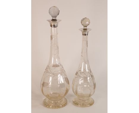 William Hutton, Birmingham, 1920, two Silver Collar cut Crystal decanters with fish and flora patterns. Height of tallest: 40