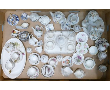 A collection of ceramic miniatures including some sets, examples from Crown Windsor, Raesuevic ceramics, Staffordshire Fine C