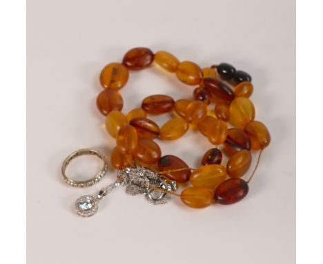 9ct gold &amp; silver eternity ring, 2g and a amber style necklace.