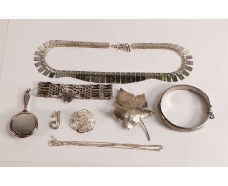 A collection of ladies Silver jewellery, including Choker necklace, gate bracelet,miniature vanity mirror, bangle, leaf brooc
