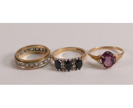 9ct gold eternity ring, and two 9ct gold stone set rings, 6.1g. (3)