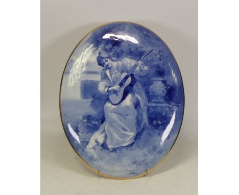 Royal Doulton, Blue Children Oval Plaque. Painted garden scene showing a seated maiden with classical guitar. Gilt border and