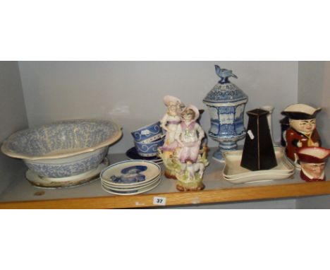 Victorian blue & white wash bowl, Toby jugs, figurines etc. (one shelf)