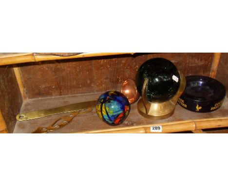 Multicoloured glass paperweight, brass mounted green glass ball, toasting fork, copper ladle etc.