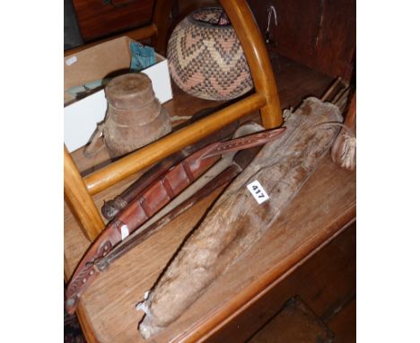 Tribal Art - African woven basket, a cowhide quiver of arrows, a ceremonial beaded Zulu knobkerrie used by young dancing girl