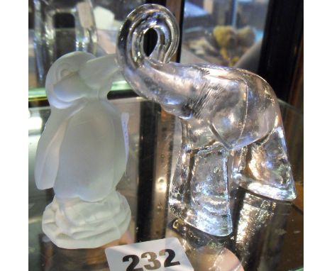 A Kosta Boda glass figure of an elephant from the Zoo Series, and a Goebel crystal glass penguin