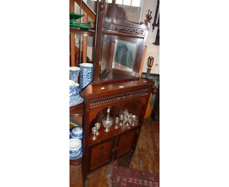 Victorian mahogany corner cabinet with carved detailing, and similar mirrored corner wall shelf