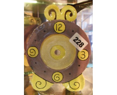 Studio Pottery purple and yellow glazed terracotta clock case made for Liberty's, marked "SB-RC"