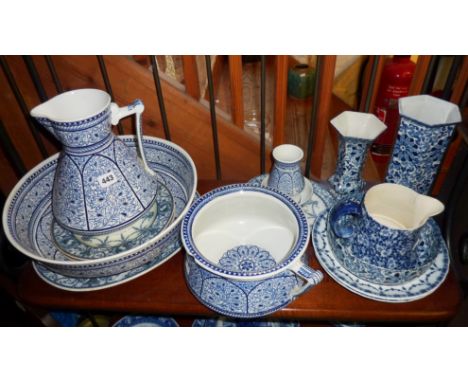 Shelf of blue & white china including washbowl, jug and chamber pot set, bowls, vases etc