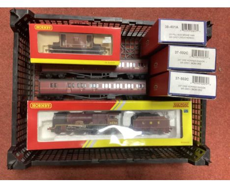A boxed Hornby Railroad 00 Gauge Patriot locomotive in LMS Red livery, together with two Hornby coaches and two boxed Brake V