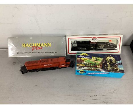 Four HO scale American outline locomotives, including boxed Bachmann Union Pacific F7A No 1468, boxed Model Power Canadian Na