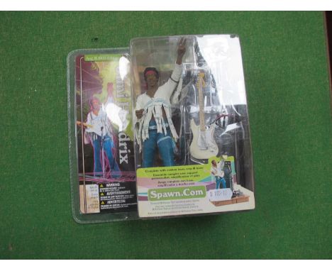 A McFarlane Toys Jimi Hendrix Super Stage Figure, 'August 18th 1969 at 0804 am', original unopened packaging.