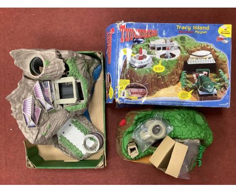A Vivid Imaginations Thunderbirds Tracy Island Electronic Playset appears unused however, box poor / damaged. Together with a