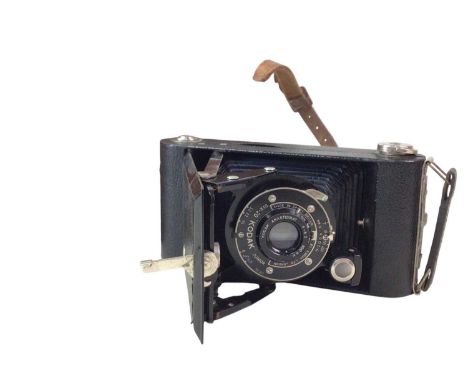 VINTAGE KODAK CAMERA, ALONG WITH FURTHER ITEMS the camera with leather case, along with an over sized brass key, a copper lio