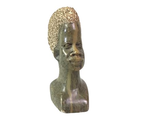 STONE CARVING OF AN AFRICAN BUST, AND OTHER ITEMS  including a stone carving of a dolphin and three Norse design paperweights