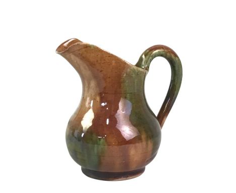 DUNMORE POTTERY BALUSTER CREAM JUG, with scroll handle10cm high