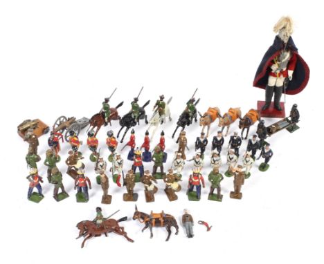 A vintage collection of assorted Britain lead toy soldiers. Including 'Stretcher bearers with decontamination suits and gas m