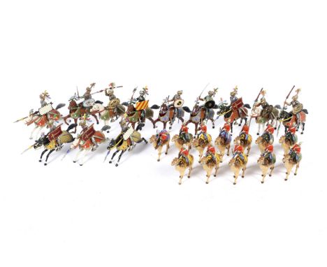 A vintage collection of lead toy figures. Including twelve British camel corps, red coat soldiers, mounted, 9cm high. Togethe