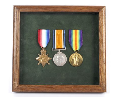 A WWI 1914-15 medal trio for the East Yorkshire Regiment  Condition Report: Not inspected out of the frame. The name C.W. Ril