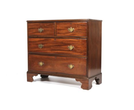 A Georgian mahogany chest of drawers. With moulded top above two short drawers and two long drawers, on bracket feet, L94.5cm