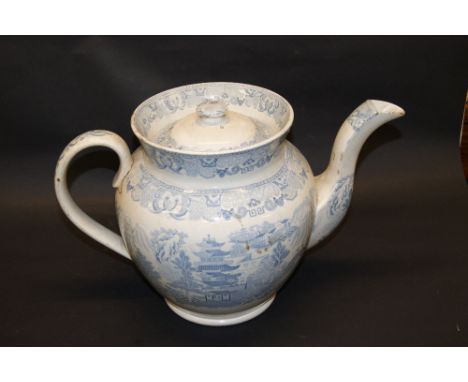 Early 19th century ceramic blue-over-white decorated teapot of extremely large proportions (A/F)