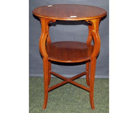 Inlaid mahogany circular occasional table, with hipped sabre supports and under shelf. Measures approximately 54cm diameter x