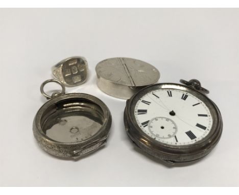 Two silver pocket watch cases, a silver ring and an oval silver pill box