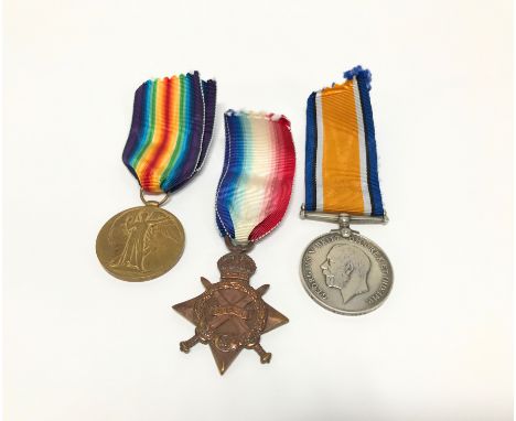 Three First World War medals, awarded to SS117308 T. S. Robinson STO 1RN, 52402 GNR H. Dury RGA and 25-830 PTE M. Charlton, N