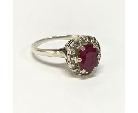 A ruby and diamond ring