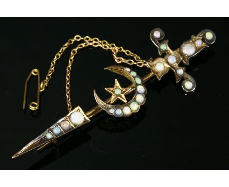 A gold opal set sword, crescent and star brooch, c.1900,with rows of graduated, circular, cabochon opals, grain set to the po