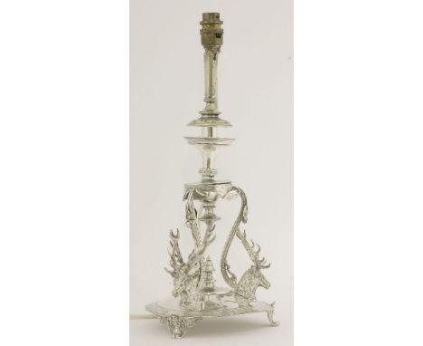 A lamp converted from a silver-plated centrepiece stand,decorated with stag heads,26cm high
