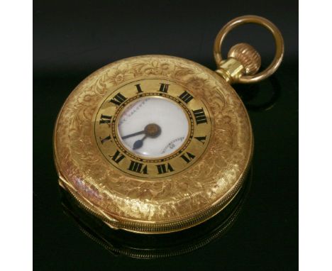 A gold half hunter Swiss pocket watch,the dial signed 'West End Watch Co., Competition, Bombay, Calcutta'.  The foliate engra