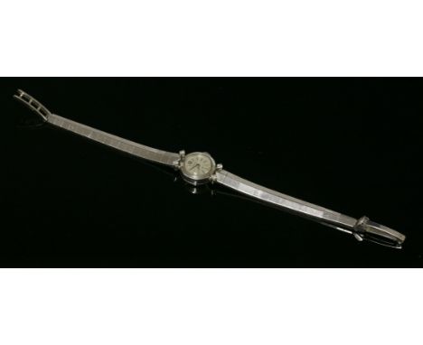 A ladies' 18ct white gold Hamilton mechanical diamond set cocktail watch, c.1960,a circular silvered dial with silver batons,