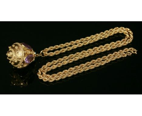An Italian amethyst and blue paste lantern pendant, c.1960,with a series of oval mixed cut amethysts rub set around the body.