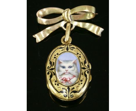 A French gold and enamel oval hinged photo locket,with a polychrome enamel cat portrait to the front cover with engraved and 