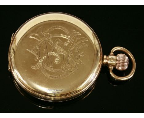 A 9ct gold hunter pocket watch,with a hand engraved monogram to the front cover.  The case 29mm diameter  with white enamel d