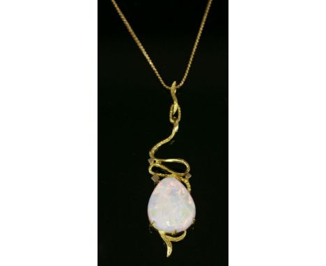 A single stone opal pendant,with a pear-shaped cabochon opal claw set to the bottom.  A scrolling polished and bark textured 