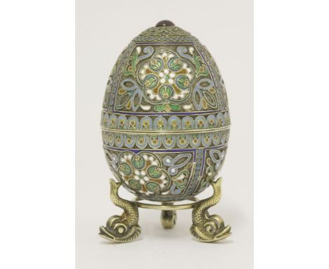 A Russian silver gilt and cloisonné enamel Easter egg,possibly for Nicholai Zugeryev, Moscow 1908-1917,decorated in polychrom