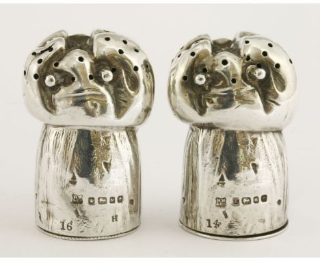 A pair of novelty silver peppers, modelled as champagne corks,by Henry Wilkinson & Co., Sheffield 1879,one with registration 