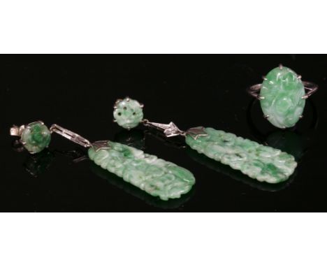 A pair of Art Deco, carved jade and diamond drop earrings, c.1925,a carved and pierced tapering jade plaque, with a milligrai