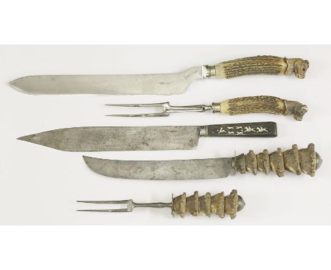 A pair of Victorian carvers,each with a vertebrae handle and steel blade and tines,impressed ‘Shear steel’,knife 36cm long,a 
