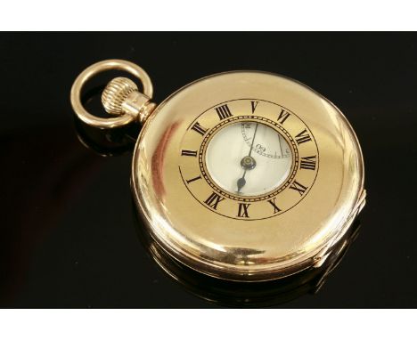 A 9ct gold half hunter pocket watch,with royal blue enamel Roman numeral chapter ring to the front cover.  The case 49mm diam