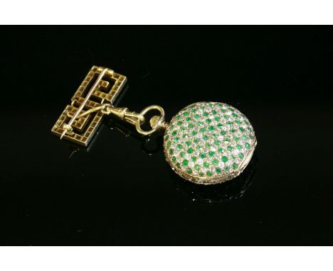 An emerald and diamond set gold fob watch,by Golay, Fils and Stahl, Genève, suspended from an emerald and diamond fob brooch.